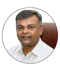 K. Balaram - President